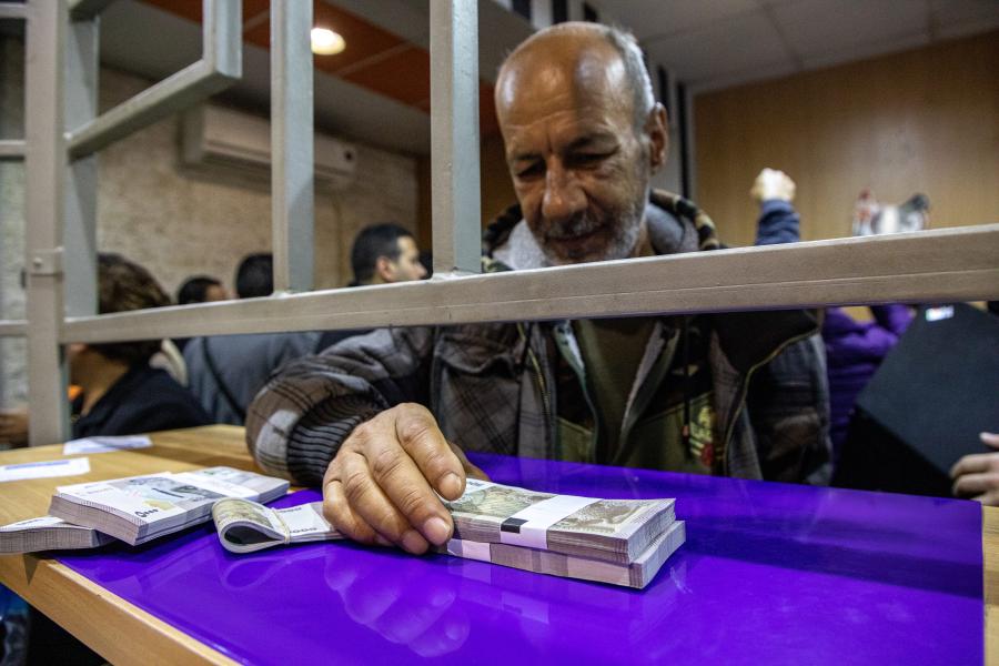 A man receiving money.
