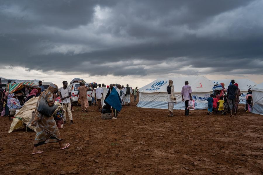 people walking during a storm